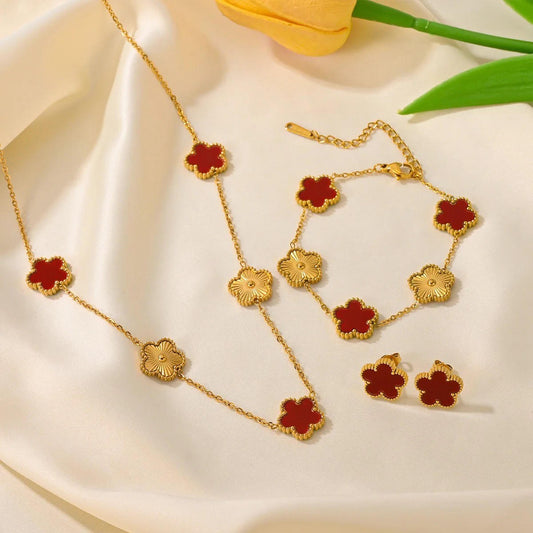"Conjunto de joyería de trébol de acero inoxidable con detalles en circón"
